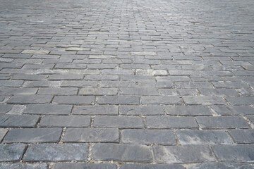 Perspective block pavement or herringbone brick tile floor walkway. Perspective concrete block pavement. City sidewalk block or the pattern of stone block paving.
