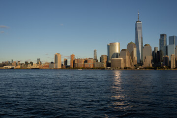 Fototapeta premium Panoramic view of New York, United States. New York city skyline in Midtown Manhattan. USA, NYC, NY, Manhattan. American big city. Lower Manhattan skyline. New York from New Jersey.
