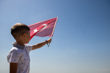 The Child and the Waving Turkish Flag, a Moment of Patriotism and Hope