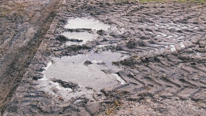 Spring Thaw Muddy Ground Difficult to Pass for Vehicle