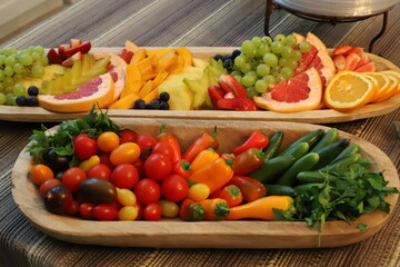 a plate in the center with a variety of food and snacks
