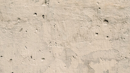 texture old concrete wall with remains of paint with damages