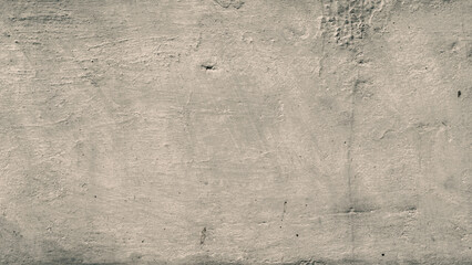 texture old concrete wall with remains of plaster with cracks