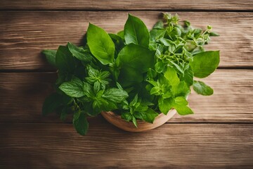 Fresh green leaves and herbs on a wooden table illuminated by natural sunlight close-up photography of nature and organic plants