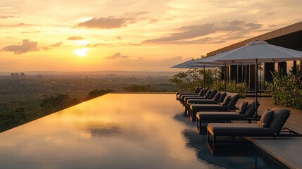 Obraz premium A luxurious poolside lounge, sleek black metal and teak sunbeds with soft gray cushions, large white parasols providing shade, infinity pool reflecting golden sunset, modern minimalist aesthetic.