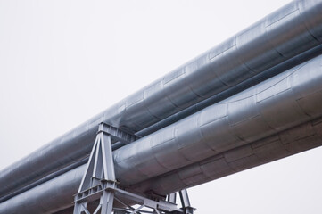 Naklejka premium pipeline on gray sky background close up