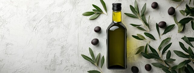 olive oil bottle  surrounded by fresh olives and green leaves on white background. Mediterranean cuisine, sustainable oil promotes, healthy lifestyle. copy space. banner 