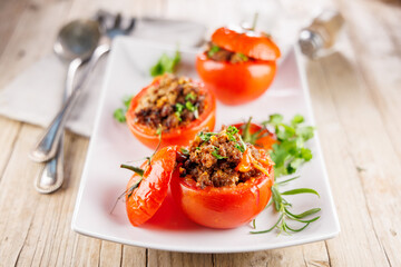 baked tomatoes stufffed with minced beef and herbs