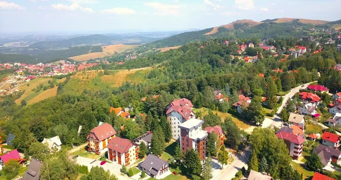 Aerial nature landscape flight over picturesque mountains forests meadows