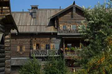 Wooden log houses in the village of Bogoslovka