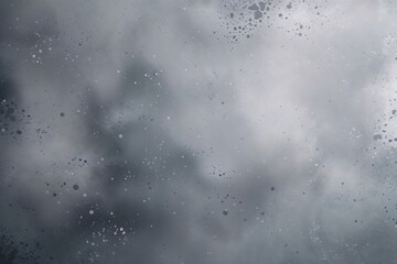 Minimalistic Gray Dappled Surface with Soft Gradients Exuding Calmness and Serenity