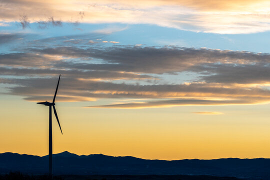 Wind turbines representing renewable energy solutions in Teruel, Zaragoza, España.