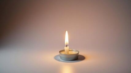 Single flickering flame of a candle on a plain white surface with a subtle gradient background that fades into darkness, ambient glow, monochromatic background, single flame