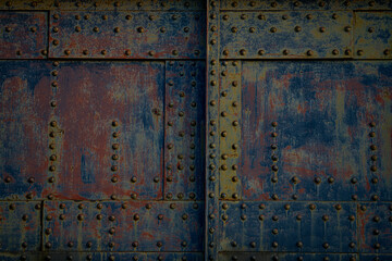 Metal heavy texture. steel background with corrosion. Metallic sheet with rust stains. Industrial metal backdrop. Corroded metal pattern. Vintage iron surface with a rustic. Rusty steel structure.