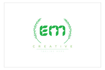 EM letters eco logo with leaf. Fresh nature and healthy leaf logo design.