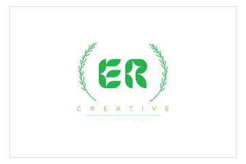 ER letters eco logo with leaf. Fresh nature and healthy leaf logo design.
