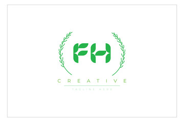 FH letters eco logo with leaf. Fresh nature and healthy leaf logo design.