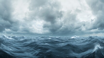 Dramatic and stunning storm clouds over the ocean with rain and waves