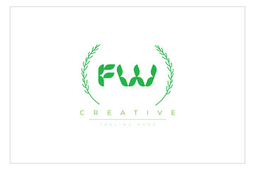 FW letters eco logo with leaf. Fresh nature and healthy leaf logo design.