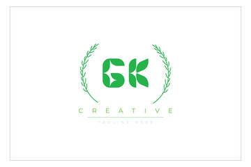GK letters eco logo with leaf. Fresh nature and healthy leaf logo design.