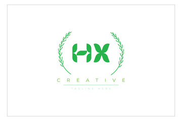 HX letters eco logo with leaf. Fresh nature and healthy leaf logo design.