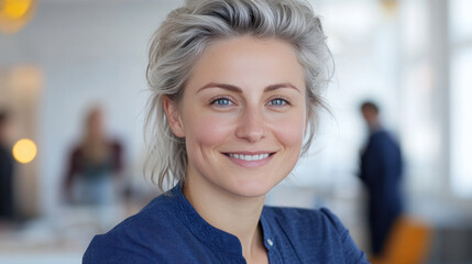 Fototapeta premium Silver hair businesswoman wearing blue smart-casual smiling at office activity
