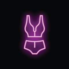 Neon sign showing a two piece swimsuit on a black background