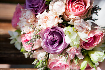 wedding bridal bouquet in boho style. bouquet of soft pink roses, eustomas and eucalyptus branches