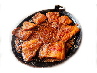 Fish Pieces Frying in a Pan on White Background