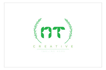 NT letters eco logo with leaf. Fresh nature and healthy leaf logo design.