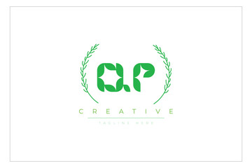 QP letters eco logo with leaf. Fresh nature and healthy leaf logo design.