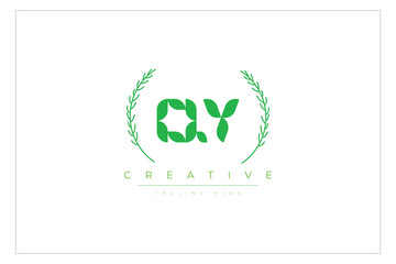 QY letters eco logo with leaf. Fresh nature and healthy leaf logo design.