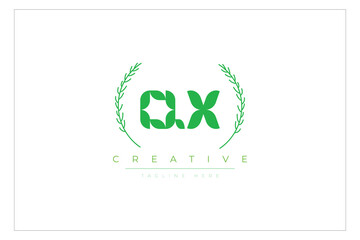 QX letters eco logo with leaf. Fresh nature and healthy leaf logo design.