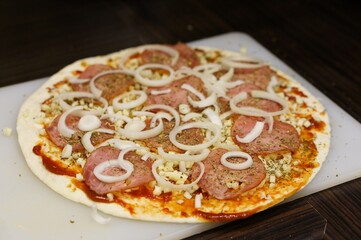 Closeup shot of a tasty pizza with onions
