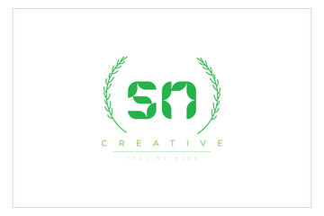 SN letters eco logo with leaf. Fresh nature and healthy leaf logo design.