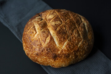 homemade bread on a  gray towel 