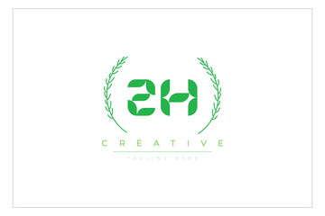ZH letters eco logo with leaf. Fresh nature and healthy leaf logo design.