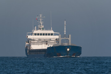 MARITIME TRANSPORT - Blue ship on the waterway