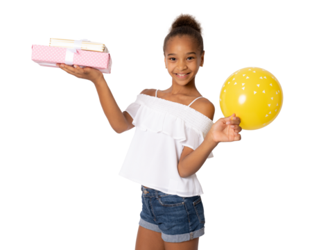 Smiling African American child girl holding gift boxes and a balloon standing isolated over transparent background. PNG transparent.