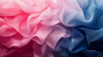 Fototapeta premium Abstract fabric texture featuring a blend of soft pink and blue hues, creating a dreamy and elegant background perfect for various design projects.
