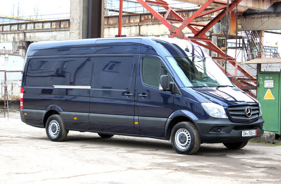 Vinnytsia, Ukraine; January 25, 2025. Blue Mercedes Sprinter 319 Cargo Van 2018 in a construction site parking lot. Mercedes Sprinter Cargo Van at city street. Cargo delivery by Mercedes Sprinter.