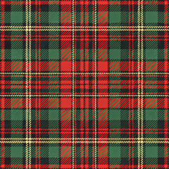 Seamless tartan fabric texture in red, green, and black