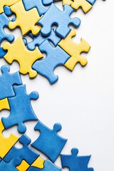 Obraz premium Photo of blue and yellow puzzle pieces on a white background, stock photo for a racing game. The top right corner is empty for text. There is white space at the bottom of the image. 