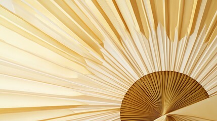A chic Art Deco fan design featuring sharp geometric lines in gold and ivory