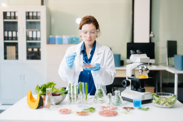 Scientist in a modern lab analyzing food samples with advanced equipment. Perfect for food science, research