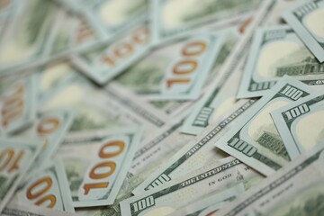 Big amount of american USD hunderd dollar bills banknotes close up