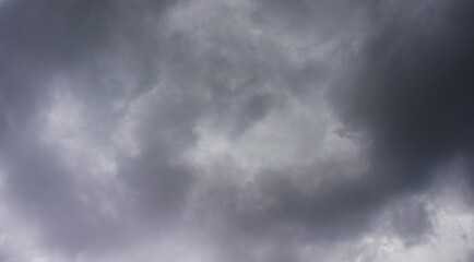 the sky is cloudy with thick black clouds, a sign that it will rain
