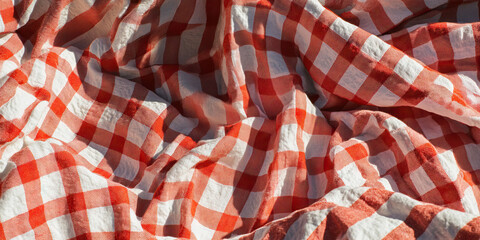 Obraz premium Draped Red and White Gingham Fabric