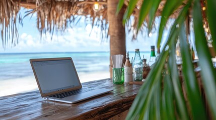 Freelancer video conferencing on a laptop at a rustic beach bar with palm leaves framing the view