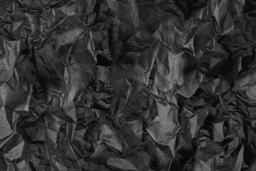 Abstract dark gray crumpled paper texture background